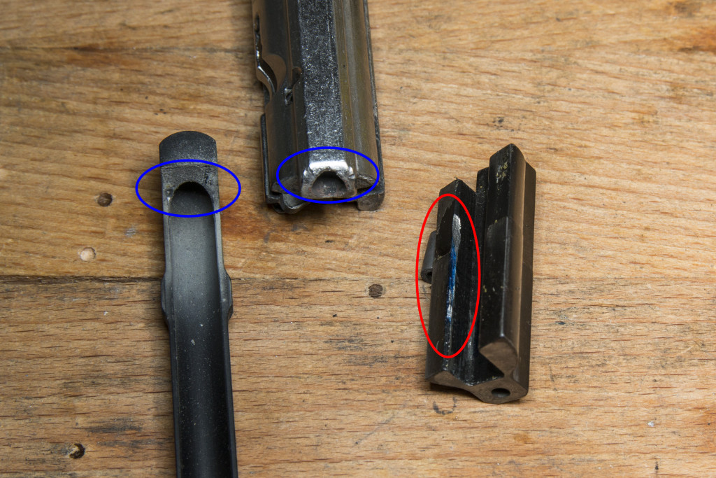 Marks on the bolt from charging handle and the new wear on the recoil spring guide/weight